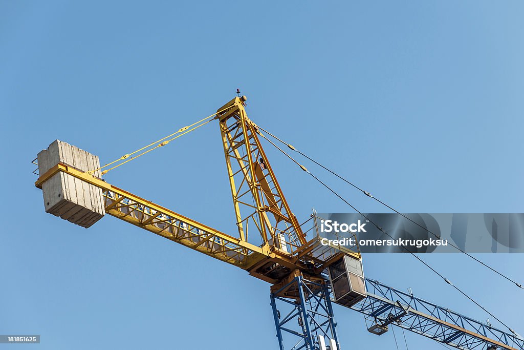 Grues - Photo de Grue - Engin de chantier libre de droits