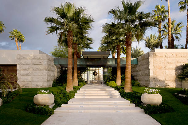 main entrance Wide angle image of a main entrance to a large custom home in Indian Wells California. phoenix stone stock pictures, royalty-free photos & images