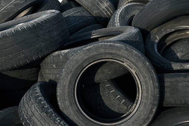 istock Black Tires Stacked on Top 181852836