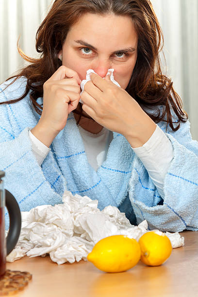 istock Mother and daughter with cold or flu 181853350