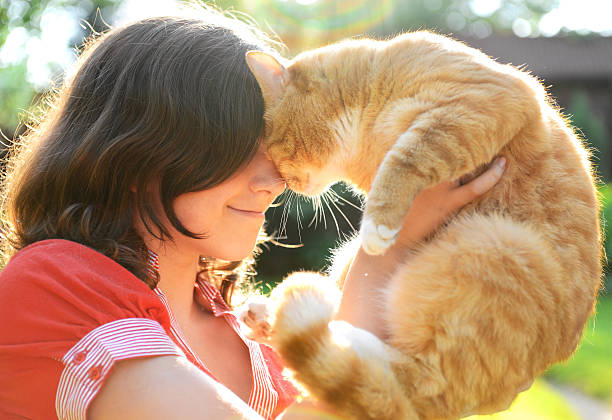 istock Girl with cat 181853444