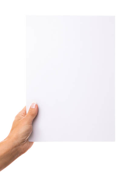 istock a4 paper in woman hand on white background 181854441