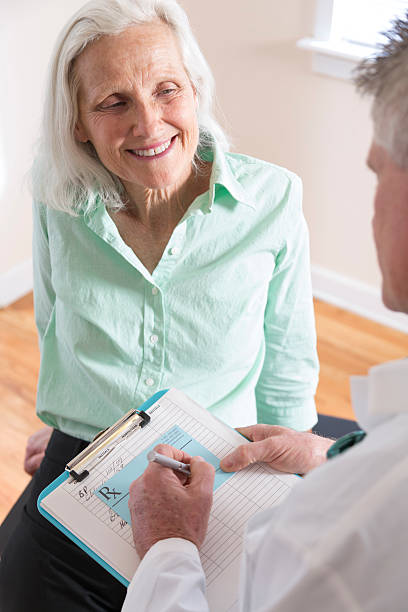 istock Senior Woman's Doctor Visit 181855381