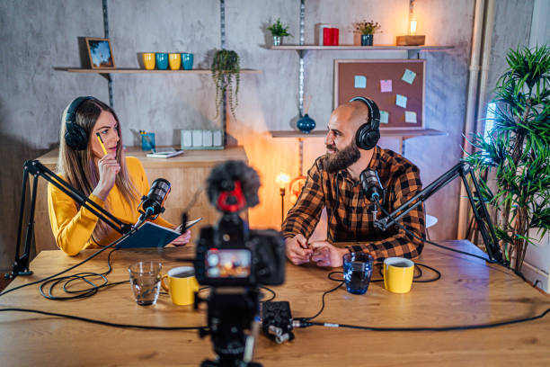 istock Podcasters recording podcast in studio 1818554176