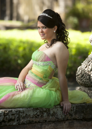 elegant quinceanera portrait on a garden