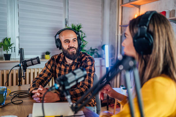 istock Two young people recording a podcast 1818555271