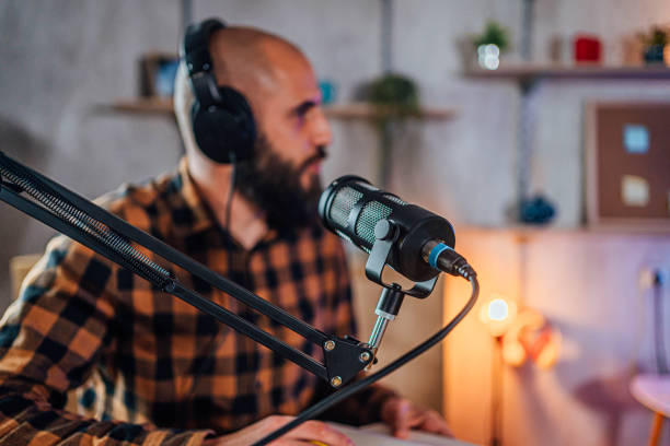 istock Man recording live podcast 1818561304