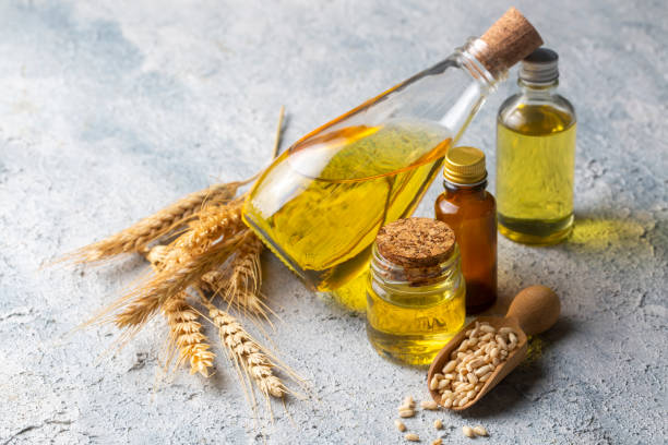 istock Wheat and wheat oil in bottles 1818561808