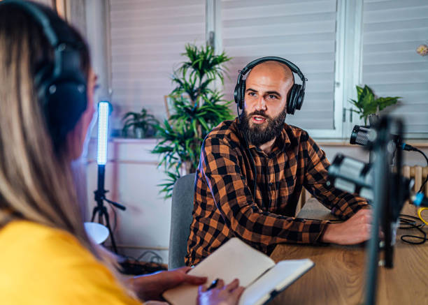 istock Woman interviewing a guest 1818561861