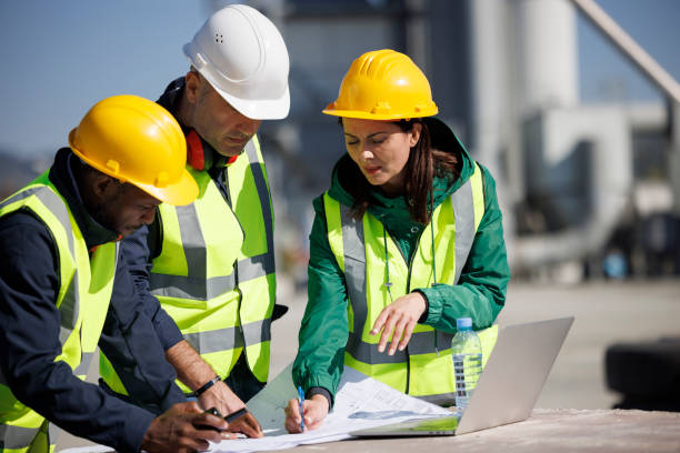 istock Engineers discussing at industrial facility 1818561873