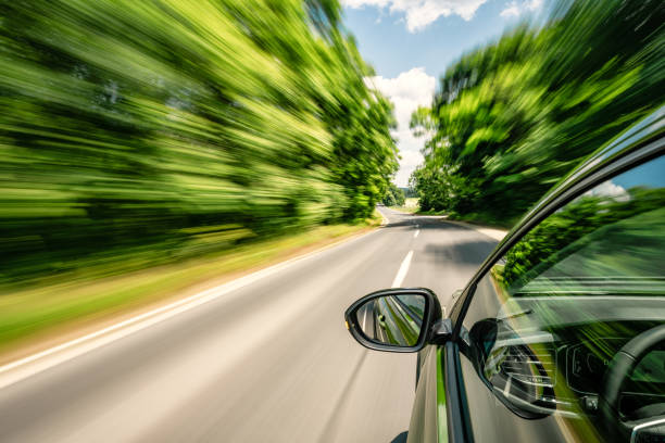 istock A car is driving on the highway, the environment is blurred 1818563936