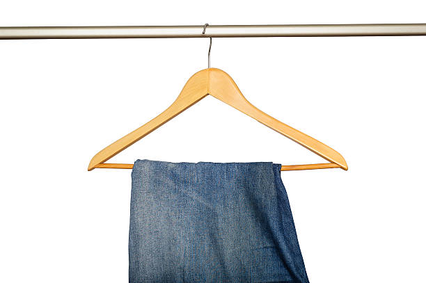 istock Jeans hanging on wooden hanger 181856498