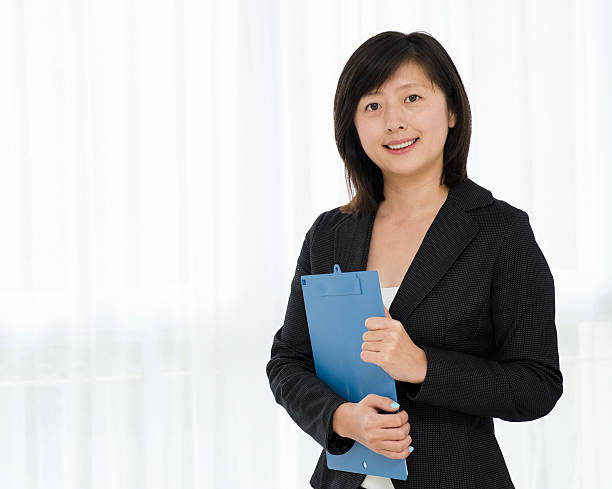 istock happy young businesswoman 181856551