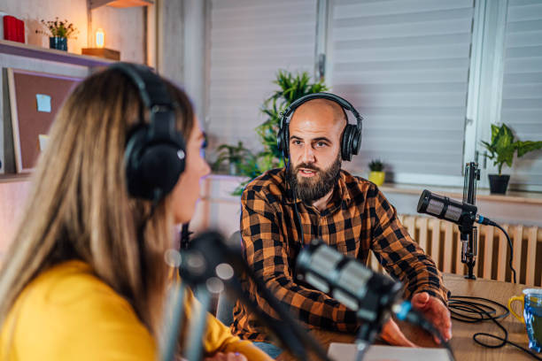 istock Two young people recording a podcast 1818565693