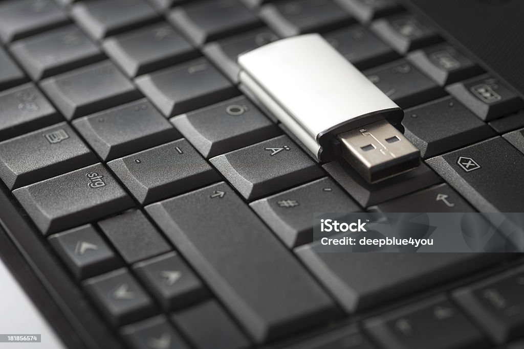 usb stick and laptop "usb stick and laptop, shallow depth of field with fokus one the USB plugs" Abstract Stock Photo