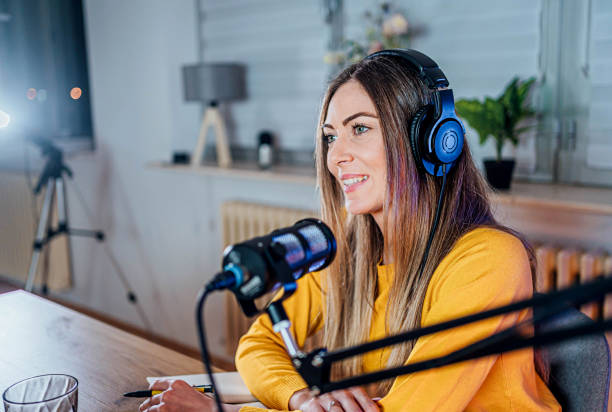 istock Female creator recording podcast 1818567083
