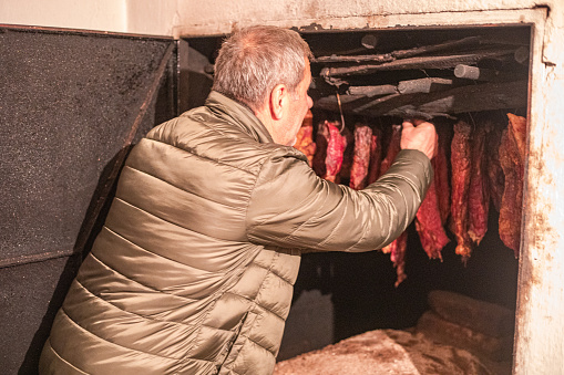 Man controls dried meat