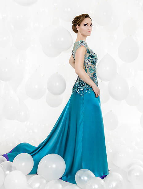 istock woman wearing long dress 181857113