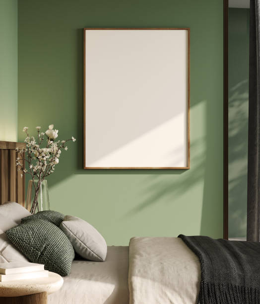 istock Blank poster frame mockup in modern bedroom interior background on green wall, 3d rendering 1818572852