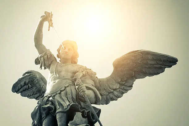 The angel St. Michael protecting Castel Sant'Angelo, an enormous bronze statue on its top.