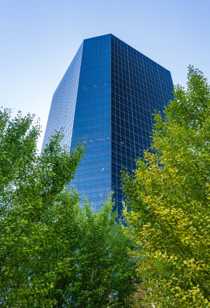 Reflection of Bosco Verticale, Vertical Forest residential towers with 900 trees as a vertical forest on the glass Unicredit Tower skyscraper building in the Porta Nuova District of Milan, Italy