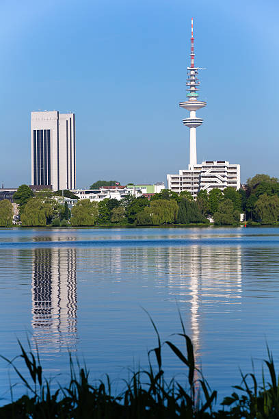 Television tower in Hamburg I LOVE HAMBURG: TV Tower behind the alster lake in Hamburg  - Germany - Taken with Canon 5Dmk3 / EF70-200 f/2.8L IS II USMYou can see more Hamburg  images in my lightbox:   I LOVE HAMBURG sendemast stock pictures, royalty-free photos & images