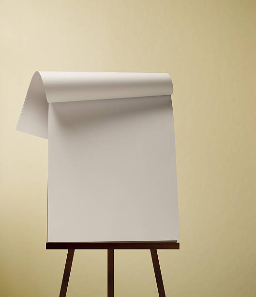 Flip Chart Flip Chart and Easel against a wall background. flipchart stock pictures, royalty-free photos & images