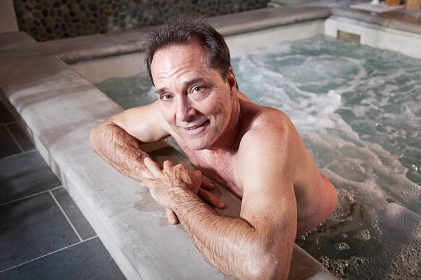 istock Mature man relaxing in hot tub 181857772