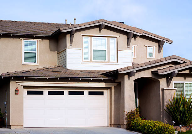 istock Stucco Home Exterior and Blue Sky 181857968