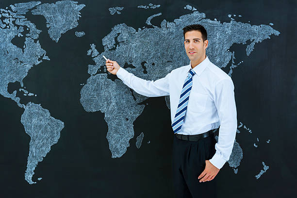 istock Businessman pointing world map: Paris, France 181858593