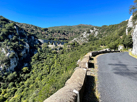 Wall on a mountain road along a valley in the Pyrenees, France. September 2023