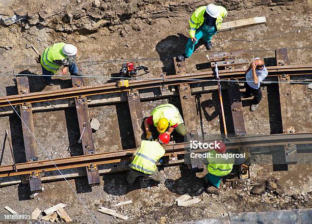 A Group Of Men Constructing A Railway Stock Photo - Download Image Now - Rail Transportation, Railroad Track, Construction Industry