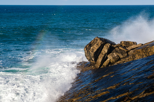 Waves and Rocks at the coast in Donostia-San Sebastian, Spain