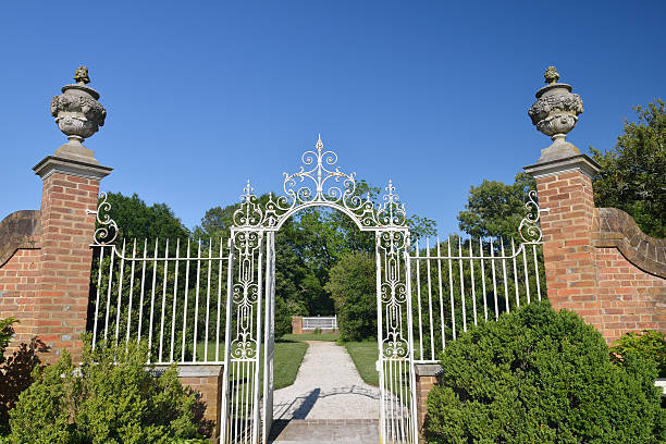 Garden Gate at Governor's Palace Garden gate at Governor's Palace in Williamsburg, Virginia, USA governor's palace williamsburg stock pictures, royalty-free photos & images