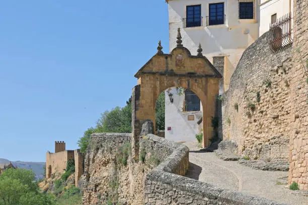 Daytime view of the Felipe V arch (Ronda, Spain).