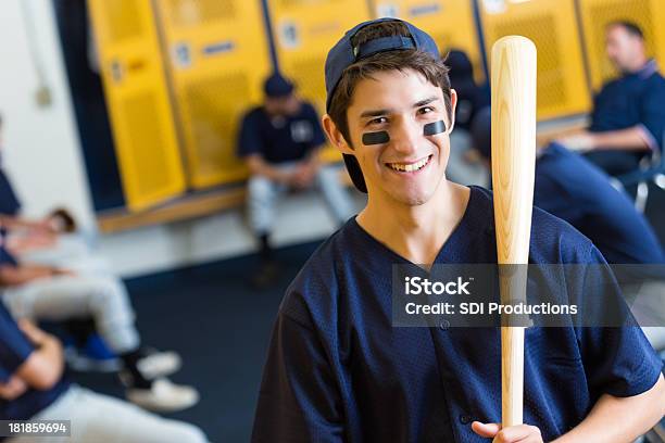 Teenage Baseball Player In Locker Room Before Game Stock Photo - Download Image Now - Teenager, Baseball - Ball, Baseball - Sport