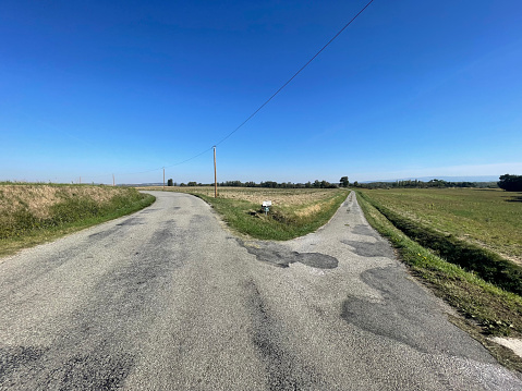 A rural road junction in Mas Sainte Puelles in France. September 2023