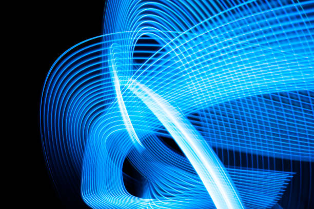 istock Colorful effect of neon lights glow and flash. Background with flying design elements. Blue background. 1818601622