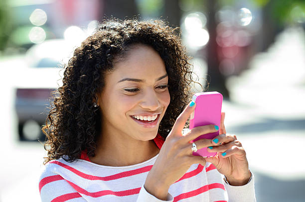 istock Young woman and phone 181860439