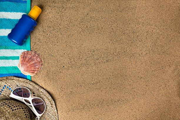 istock Beach background with sun hat, towel and sunscreen 181861079