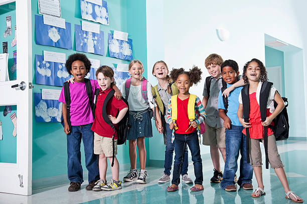 istock Children in school hallway 181861398