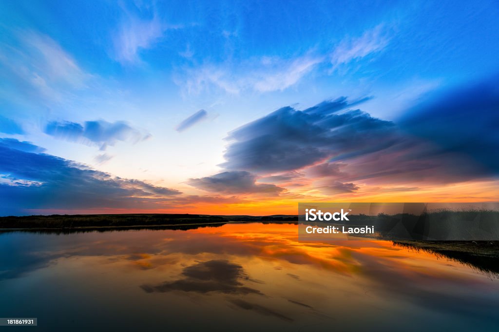 Sunset at lake Beautiful sunset on the lake. Aspirations Stock Photo