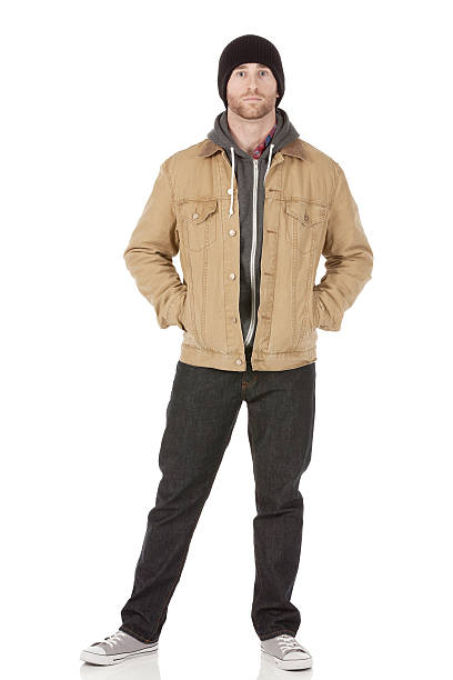 istock Attractive young man posing with hands in pocket 181862124