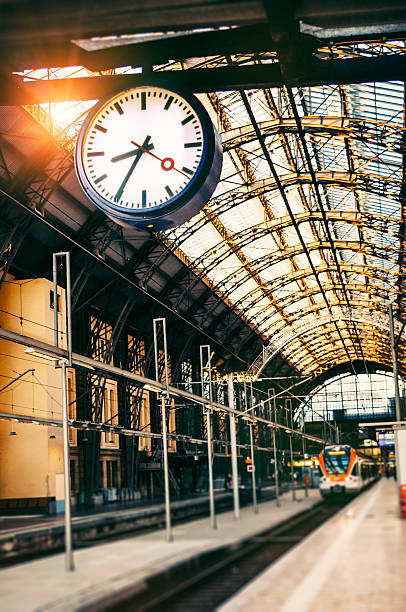 Regional train waiting for departure at Frankfurt central station. Toned image, Tilt-shift effect and added grain.