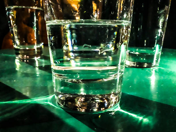 istock Glasses with water at table at pub courtyard 1818623560