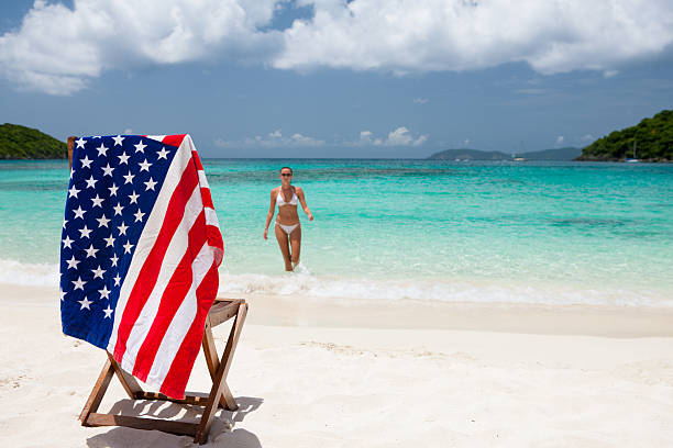 istock woman during summer vacation at a beach in USVI 181862515