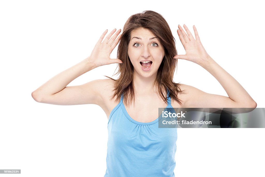 Shocked woman Young girl isolated in white background with blue shirt 20-24 Years Stock Photo