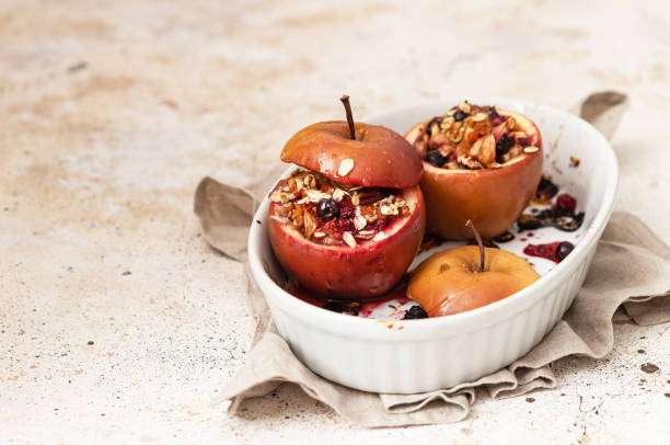 istock Baked Apples Stuffed with pecans, oatmeal and cinnamon 1818627031