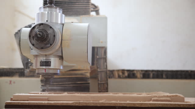CNC machine during processing wood