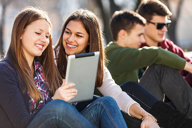 istock A woman holding a digital tablet 181864164